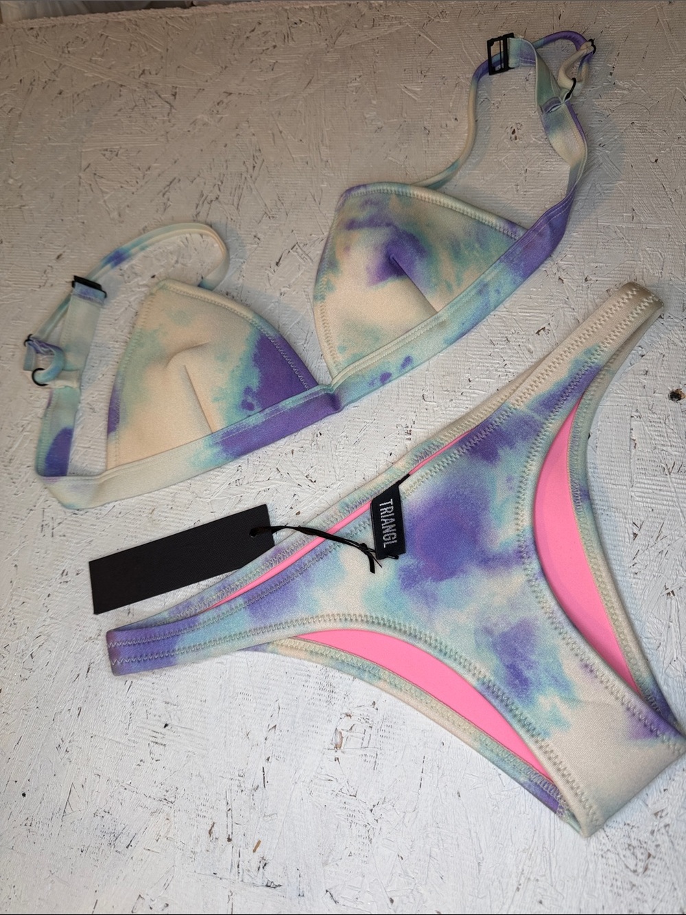 Triangj NWOT bikini set SZ extra small bottom and small top. The new knee frame.